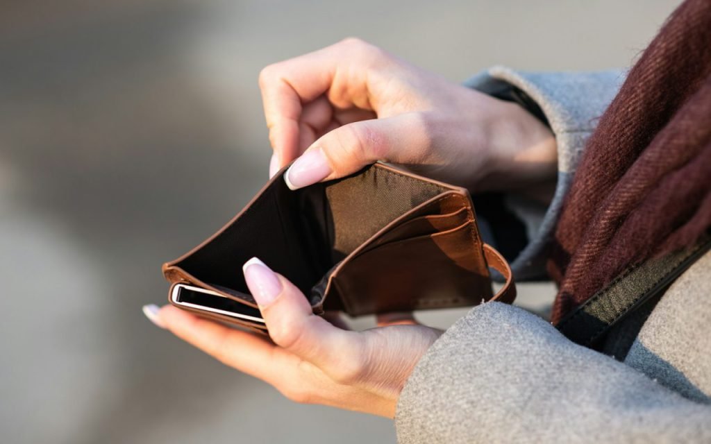Empty wallet held open in two hands
