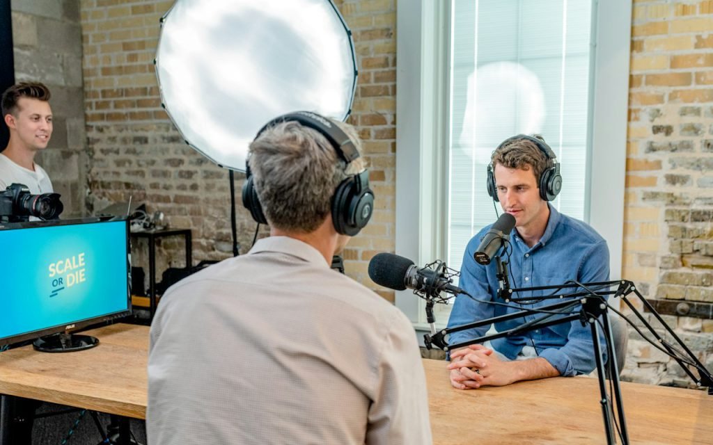 A small recording setup with a microphone and headphones