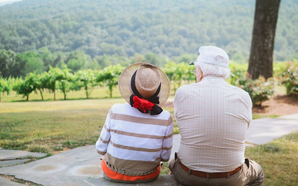 Older adults walking together along a sidewalk