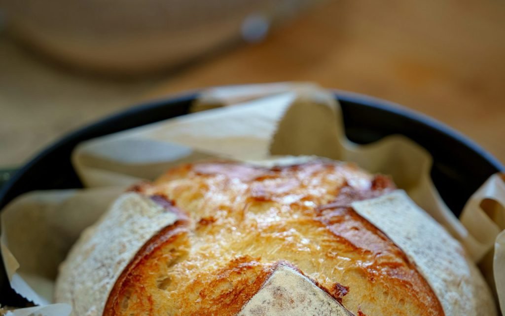 A heavy enameled Dutch oven on a kitchen counter
